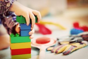 child playing with blocks